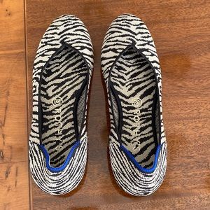 Rothy’s zebra black/cream flats